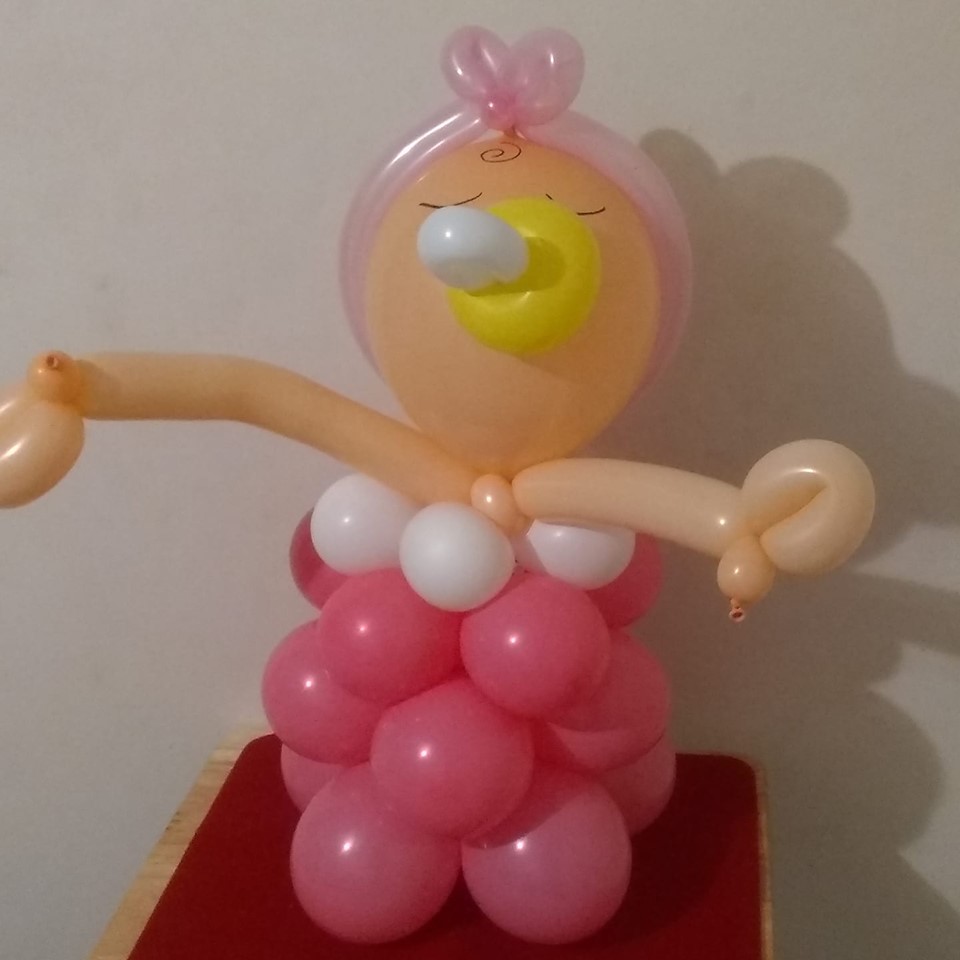 Baby shower balloon table centerpiece in pink