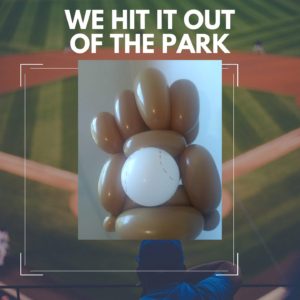Twisted baseball balloon glove with a white balloon baseball in the center 