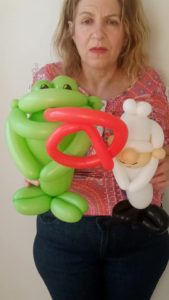 Twisted frog balloon with a long tongue sticking out
