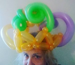 Twisted yellow and green Mardi Gras hat for a celebration