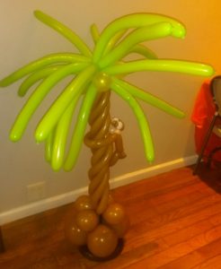 'Monkey in a palm tree twisted balloon decoration for a children's party