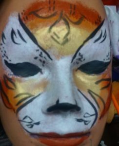 Golden cat face painting design
