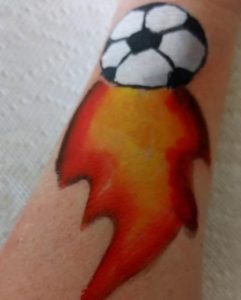 Soccer ball with fire arm painting design