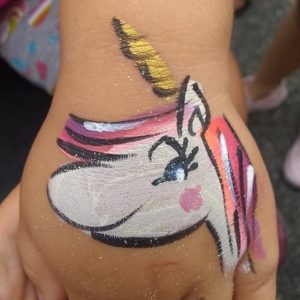 Unicorn with pink mane arm  painting design