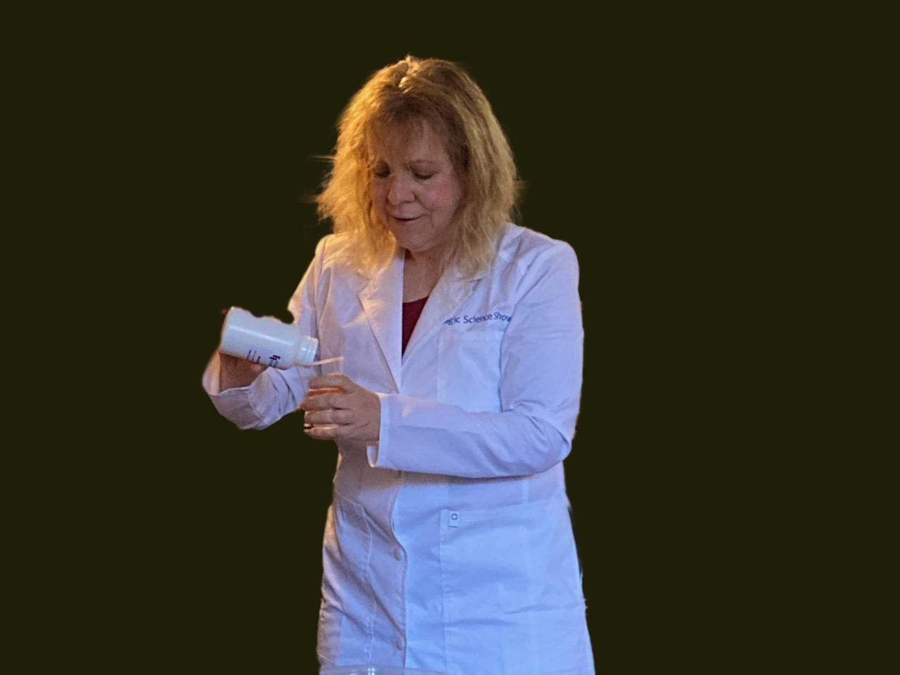 Wendy the wacky scientist pouring a scientific magic powder