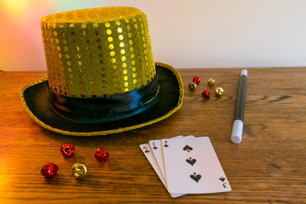 Magic hat with magic wand and cards