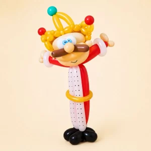 Colorful balloon king sculpture created by a Long Island balloon twister.