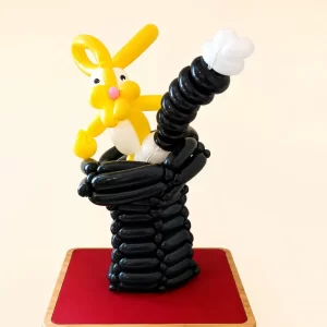 Balloon rabbit in a magic hat with a magic wand created by a Long Island balloon twister.