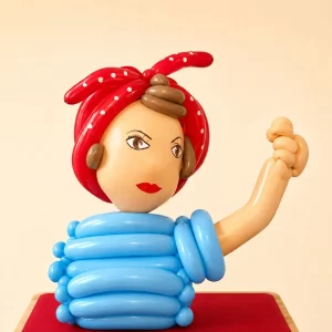 Rosie the Riveter balloon sculpture created by a Long Island balloon twister.